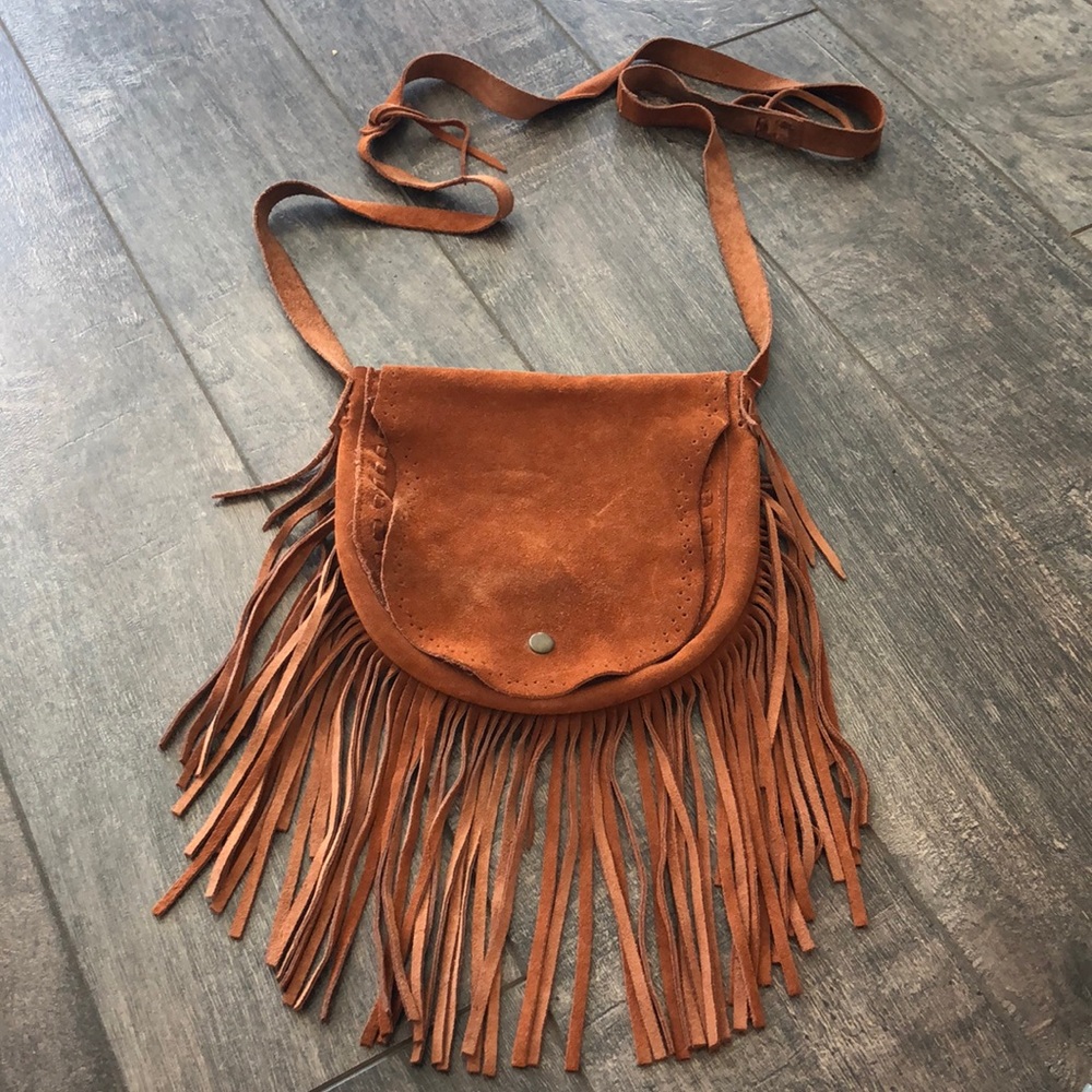 Tan suede fringe cross body bag